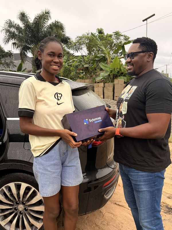 A landowner receiving her document pack from the Sytemap team